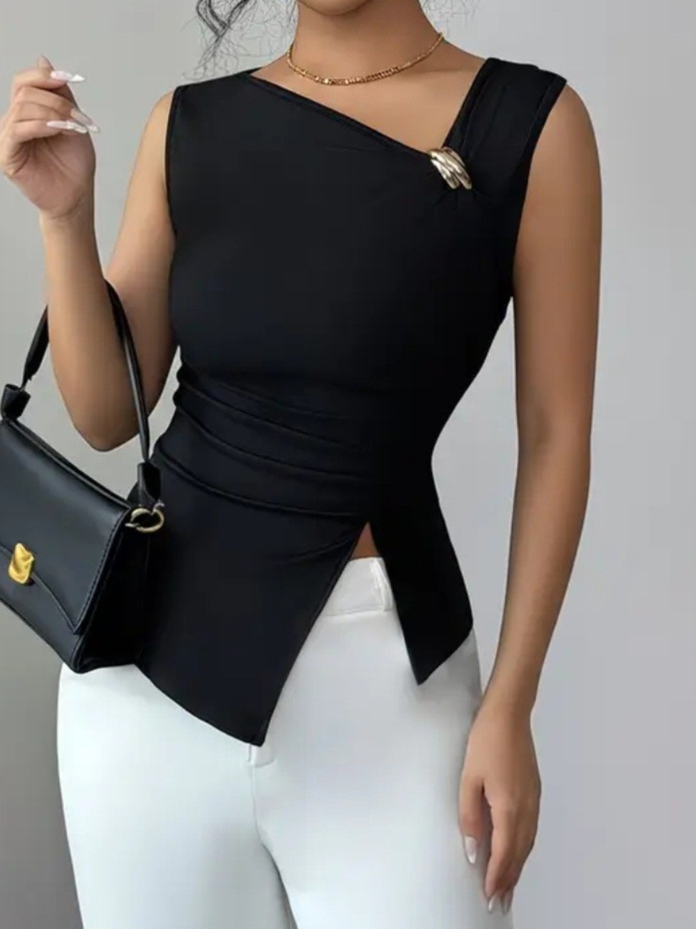 Chic Black Asymmetrical Sleeveless Top with Gold Accent